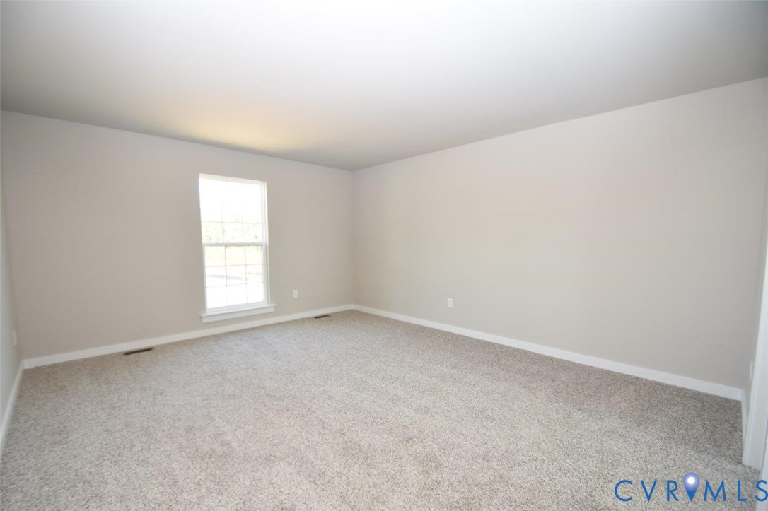 1088 Hanback Road Gordonsville, VA 22942 - Photo 9 of 26 an empty room with a window