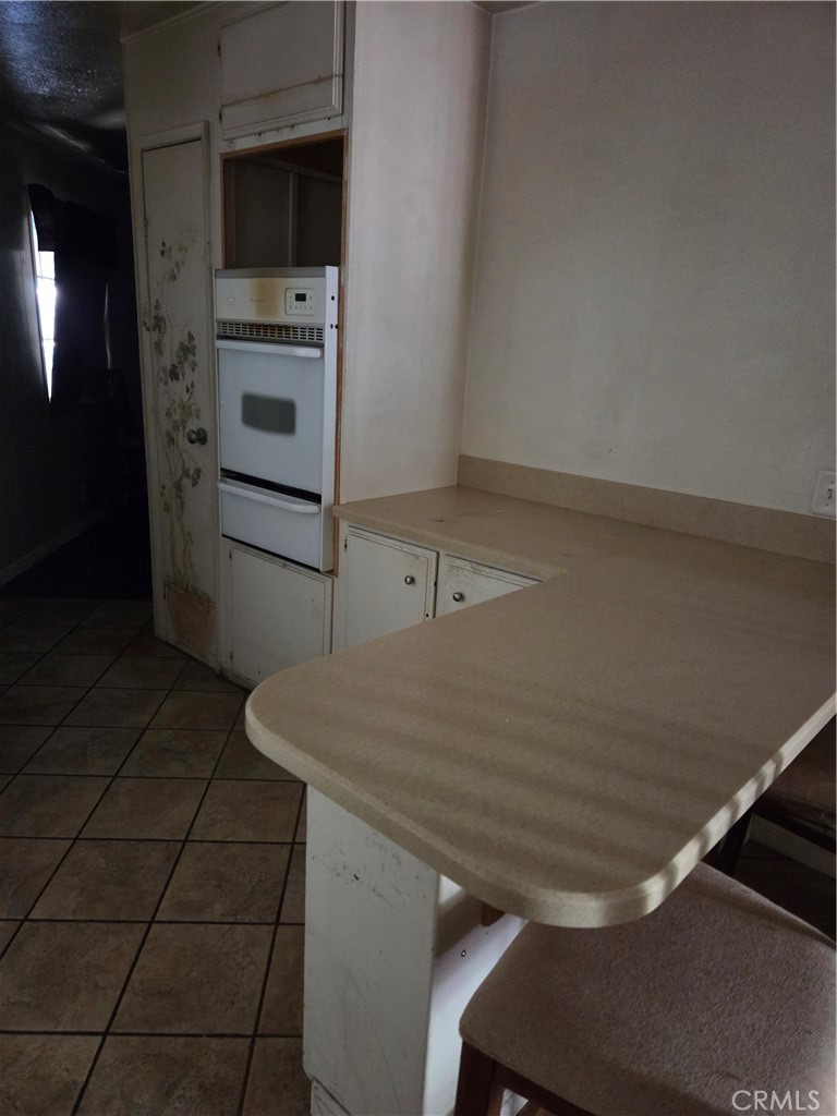 22899 Byron Road, Unit 41 Crestline, CA 92325 - Photo 5 of 10 a room with storage and utility