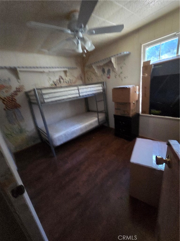 22899 Byron Road, Unit 41 Crestline, CA 92325 - Photo 9 of 10 a living room with furniture and a flat screen tv