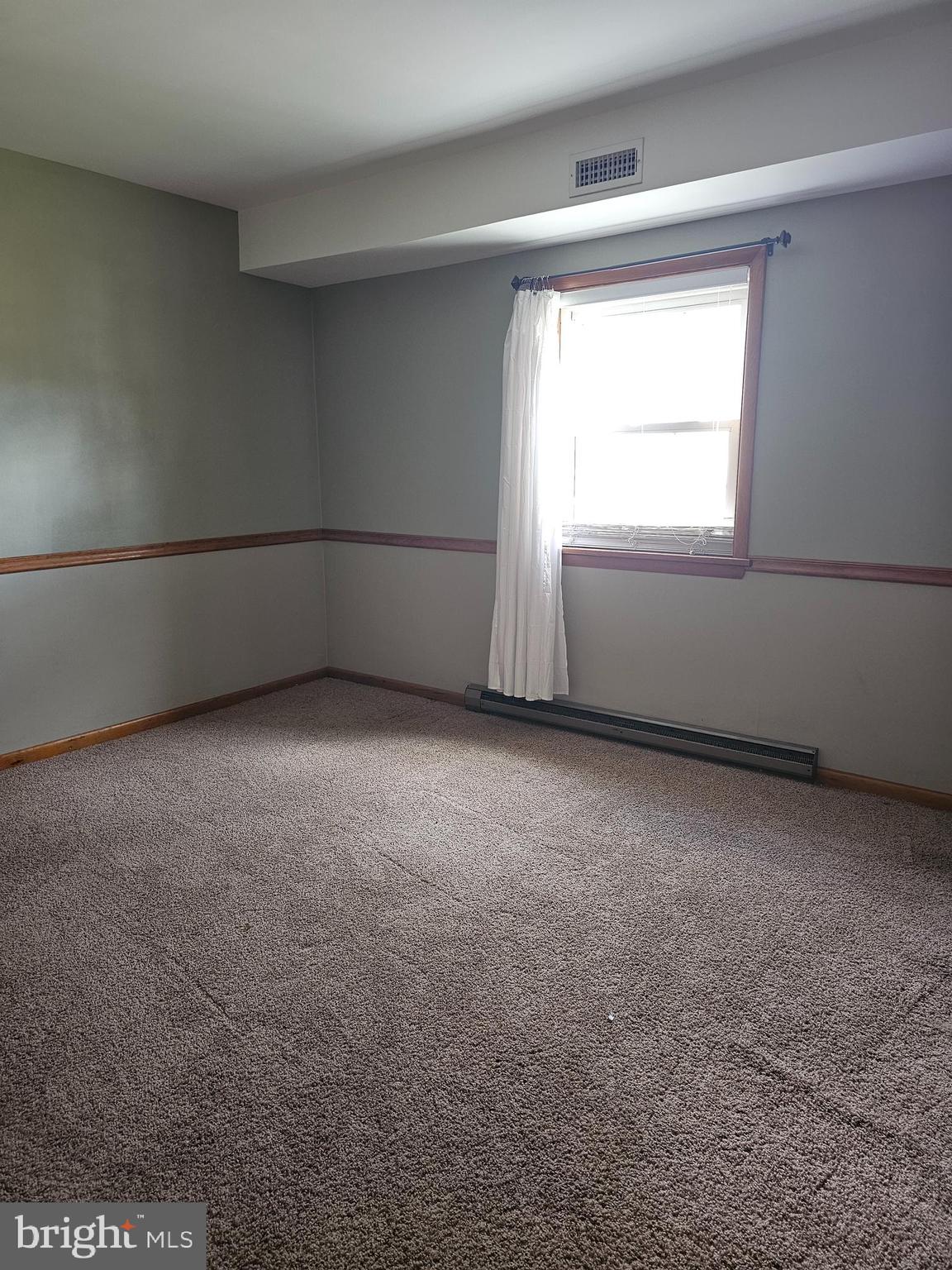 615 Villa Avenue, Unit B Front Royal, VA 22630 - Photo 15 of 21 a view of an empty room with a window