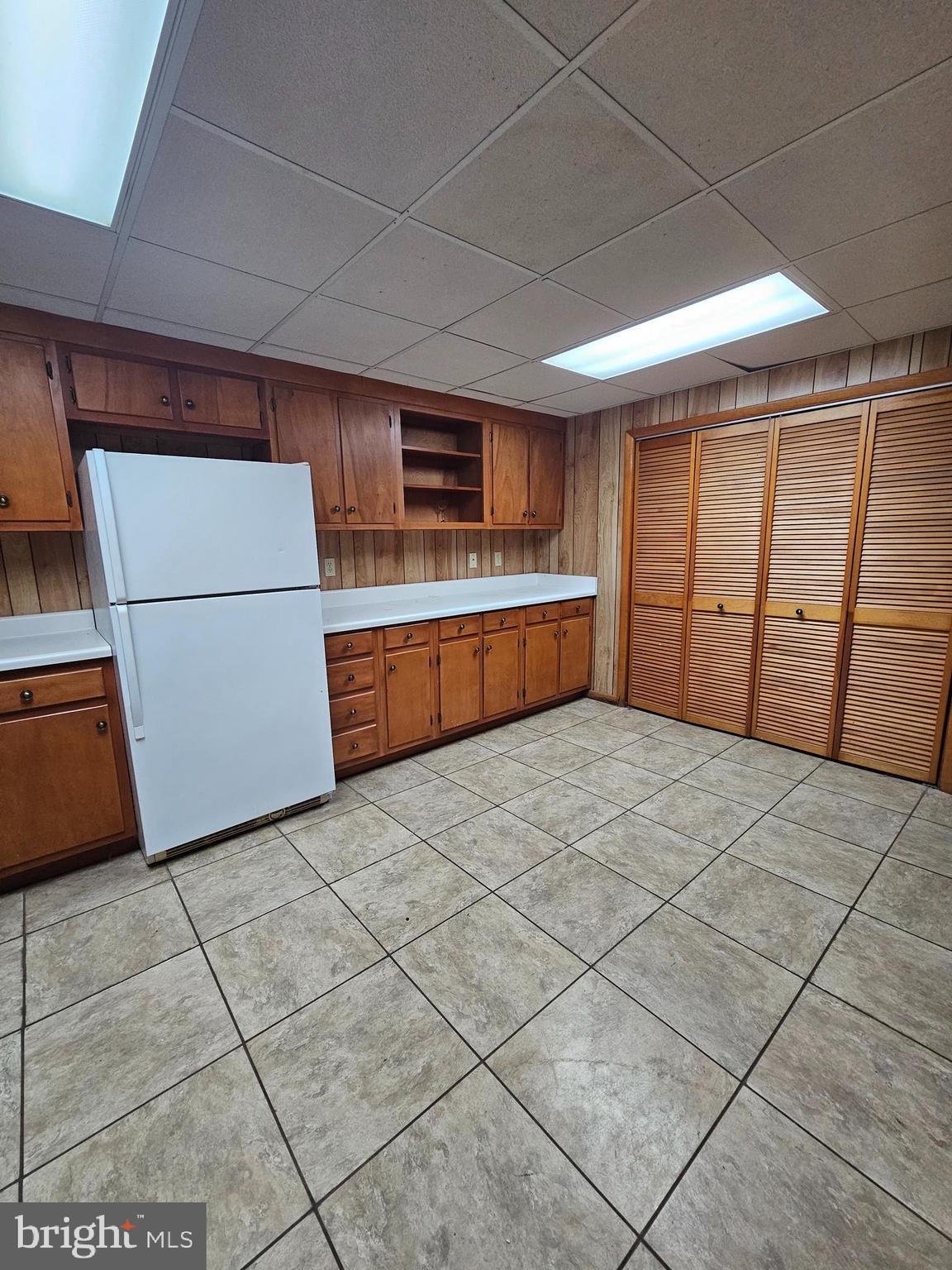 615 Villa Avenue, Unit B Front Royal, VA 22630 - Photo 7 of 21 a kitchen with stainless steel appliances a refrigerator sink and cabinets