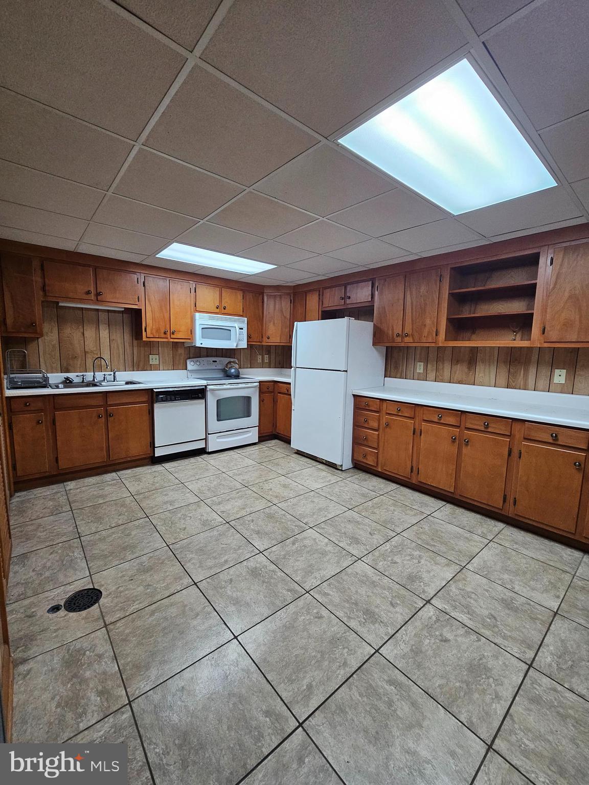 615 Villa Avenue, Unit B Front Royal, VA 22630 - Photo 8 of 21 a large kitchen with stainless steel appliances and cabinets