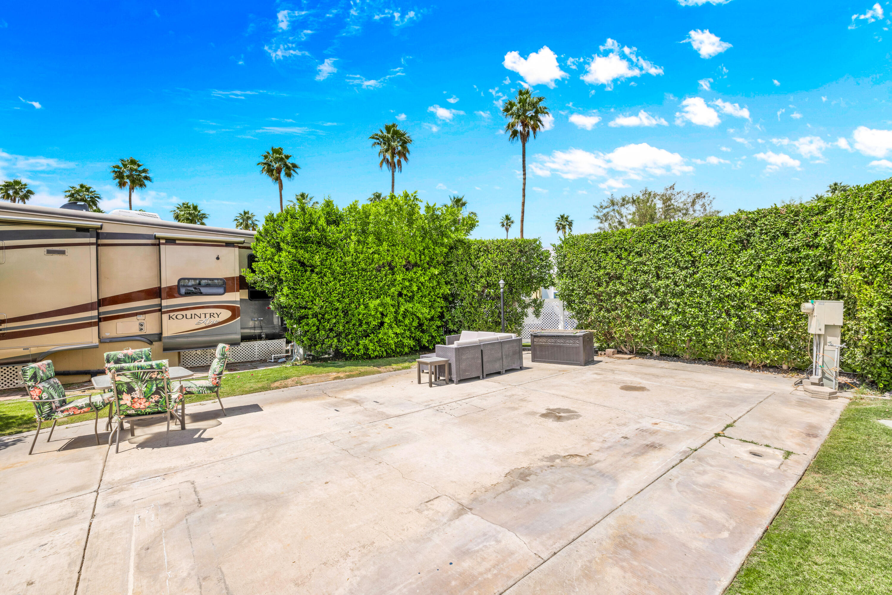 69411 Ramon Road, Unit 359 Cathedral City, CA 92234 - Photo 12 of 51 a view of a chair and table in the patio