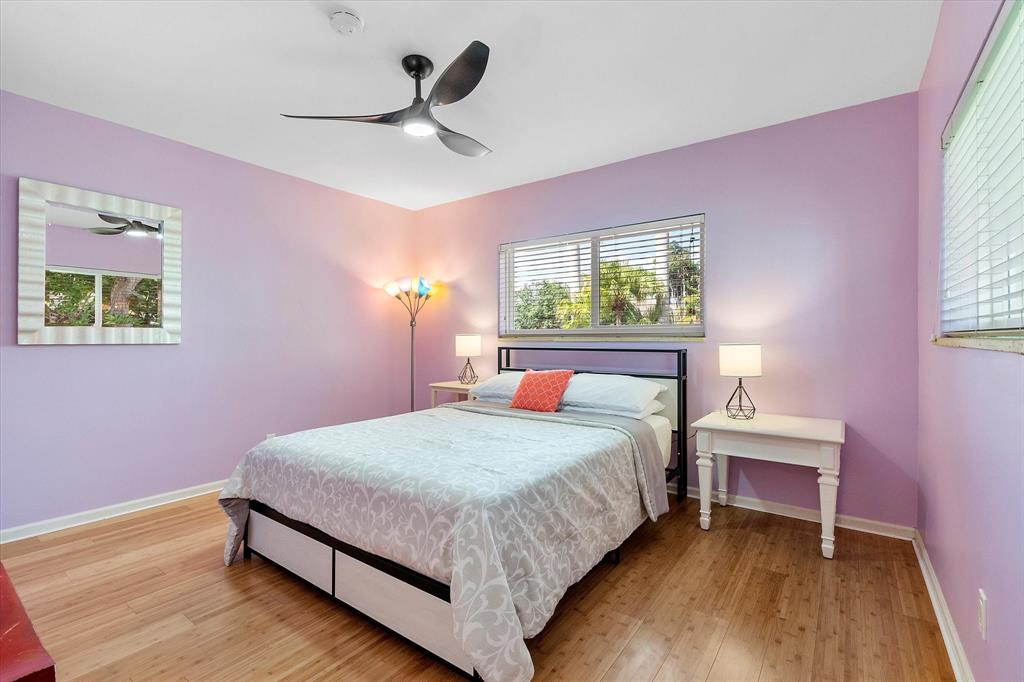 2484 Southeast 12th Street Pompano Beach, FL 33062 - Photo 36 of 61 a bedroom with a bed and a window