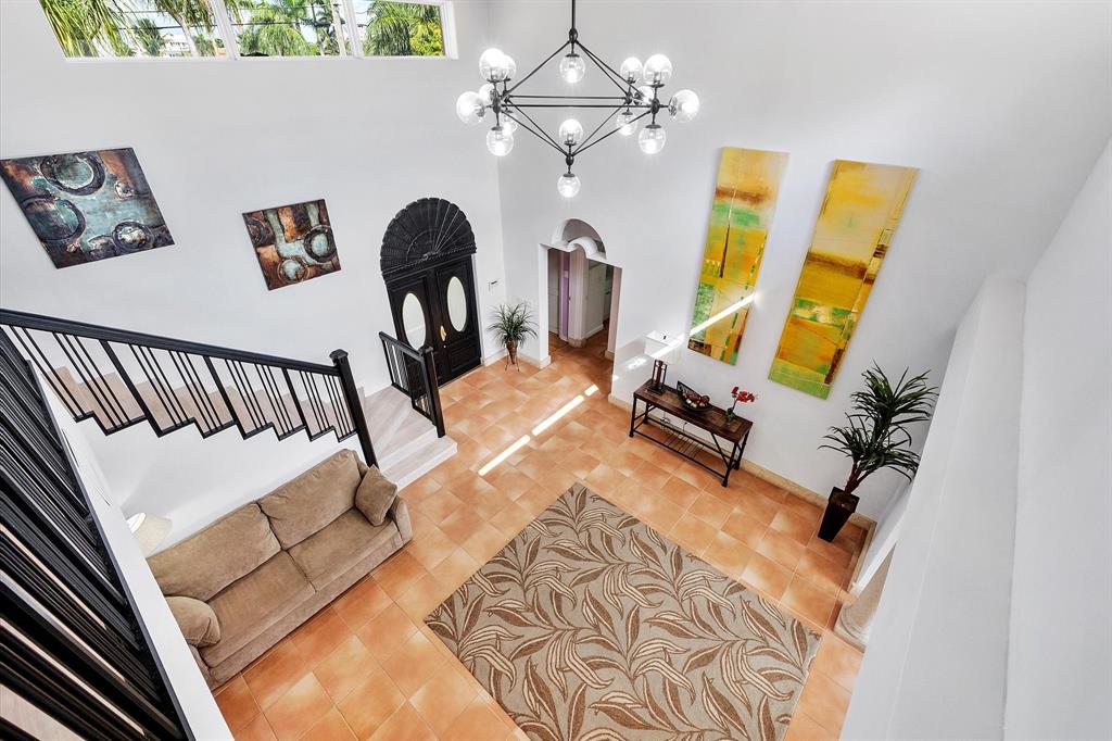 2484 Southeast 12th Street Pompano Beach, FL 33062 - Photo 42 of 61 a bedroom with furniture and a window