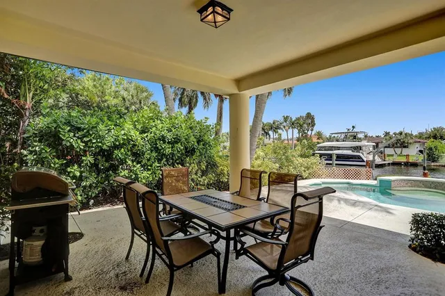 a view of a swimming pool with a patio