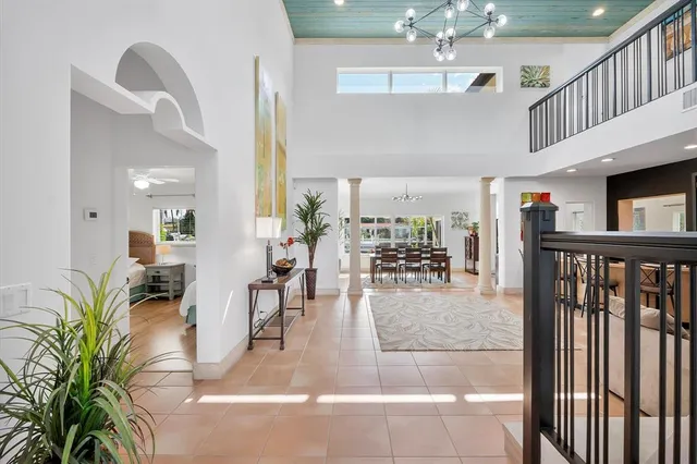 a view of a livingroom with furniture and white walls