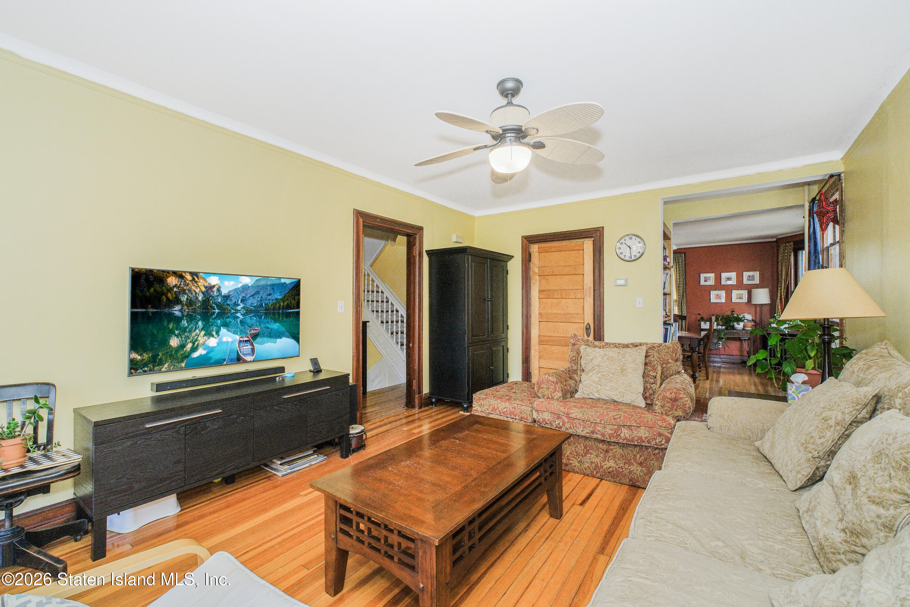 98 Hamilton Avenue Staten Island, NY 10301 - Photo 29 of 55 a living room with furniture a rug and a window