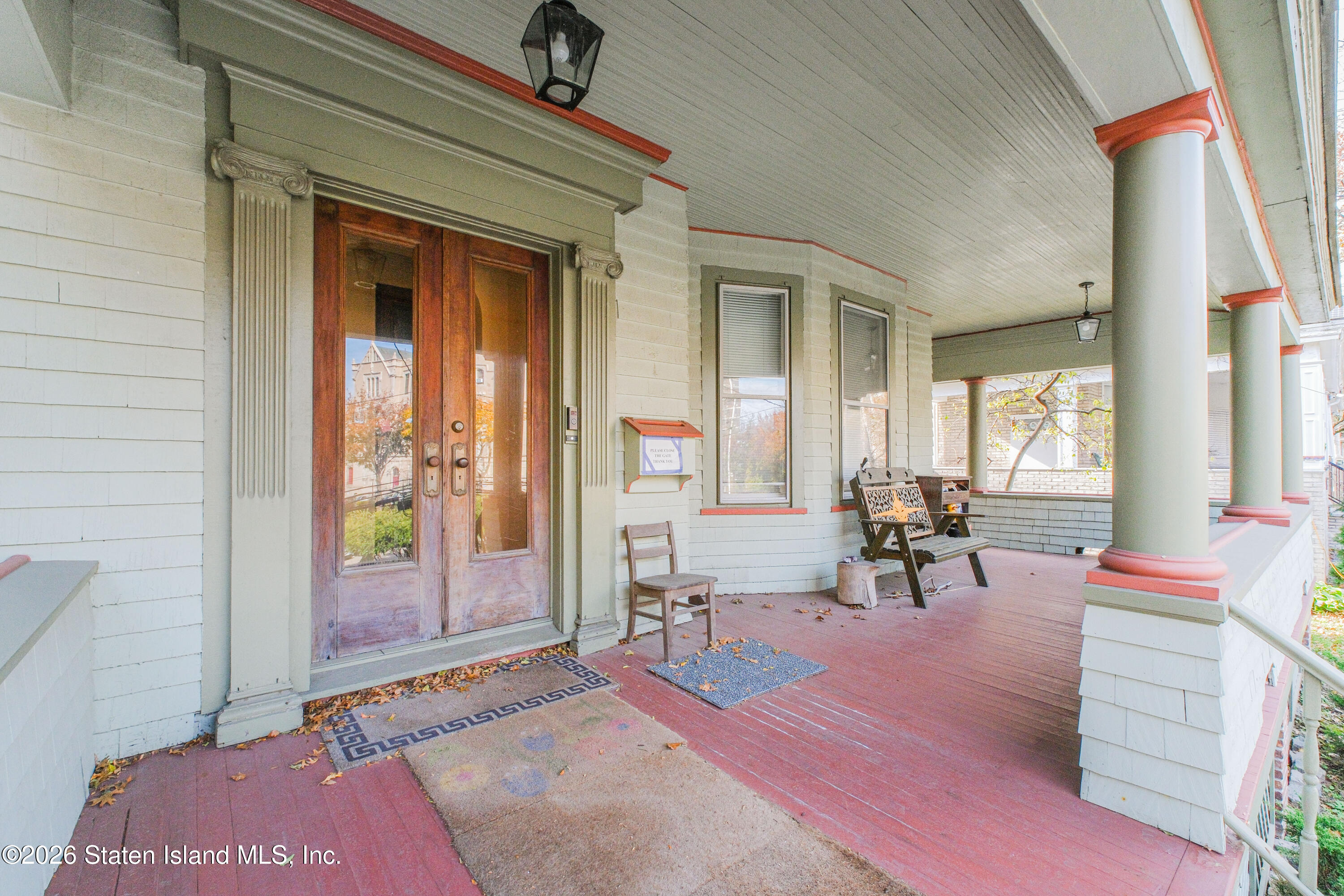 98 Hamilton Avenue Staten Island, NY 10301 - Photo 3 of 55 a living room with furniture and a window