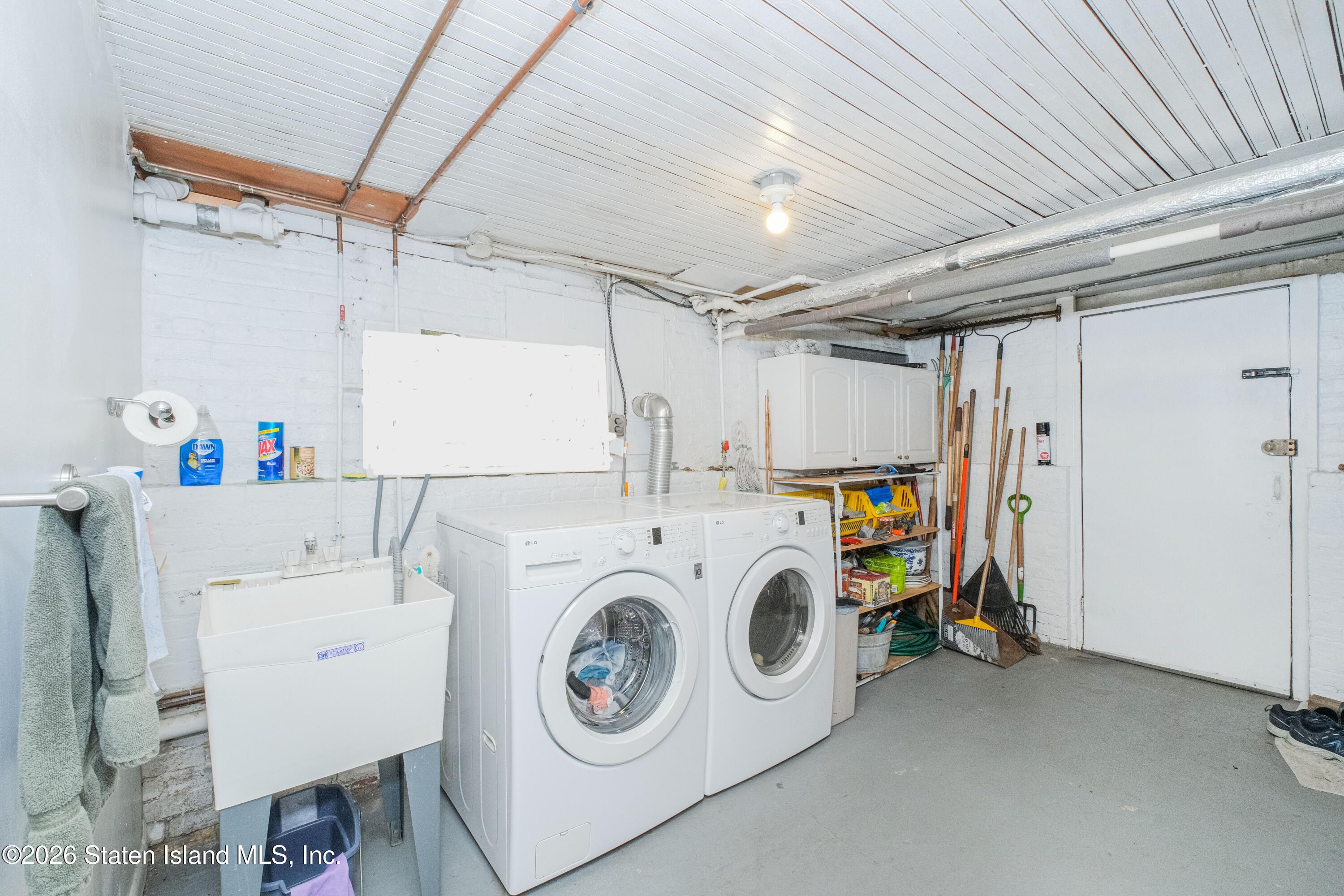 98 Hamilton Avenue Staten Island, NY 10301 - Photo 43 of 55 a utility room with dryer and washer