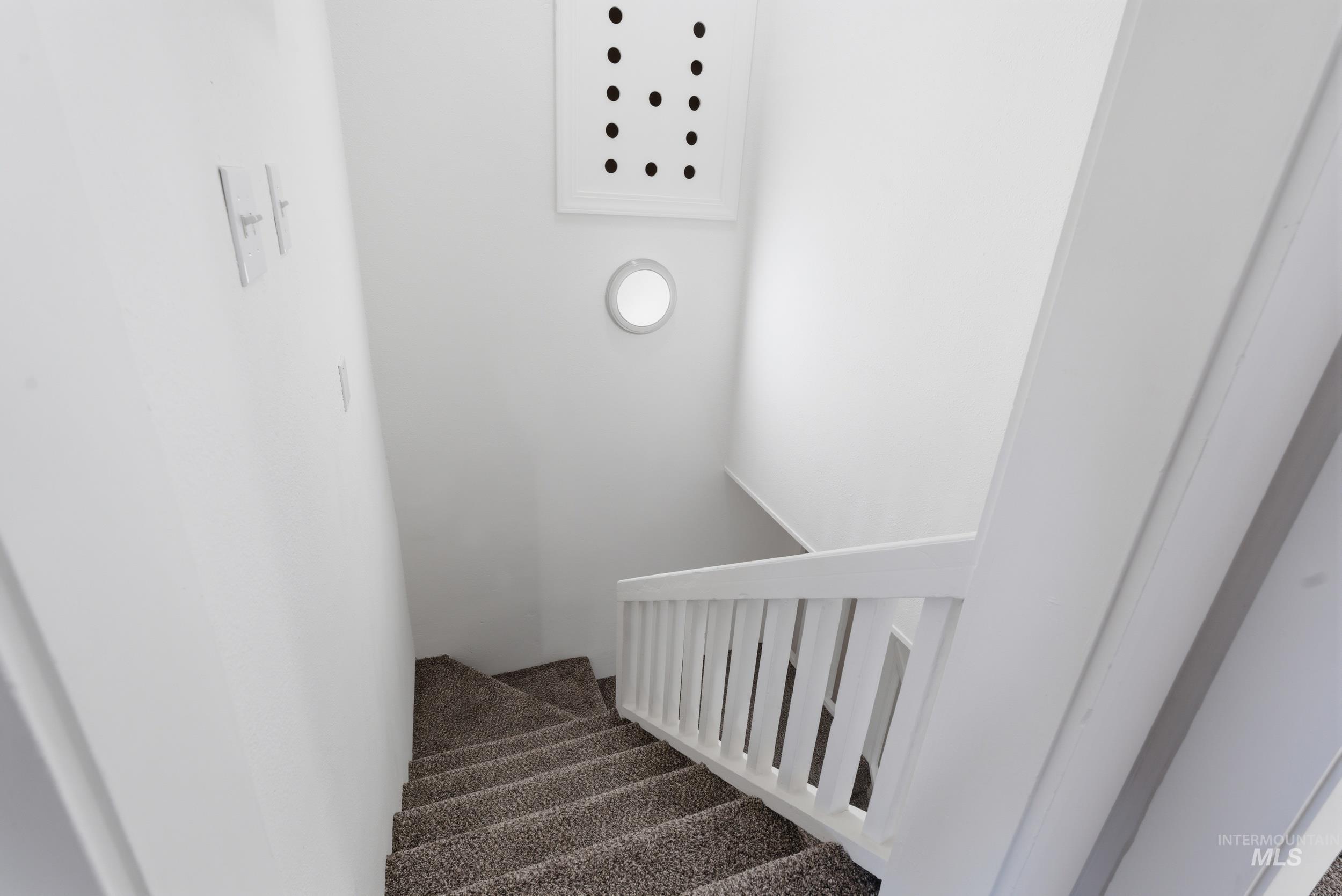 107 West Main Street Declo, ID 83323 - Photo 16 of 32 Staircase featuring carpet floors