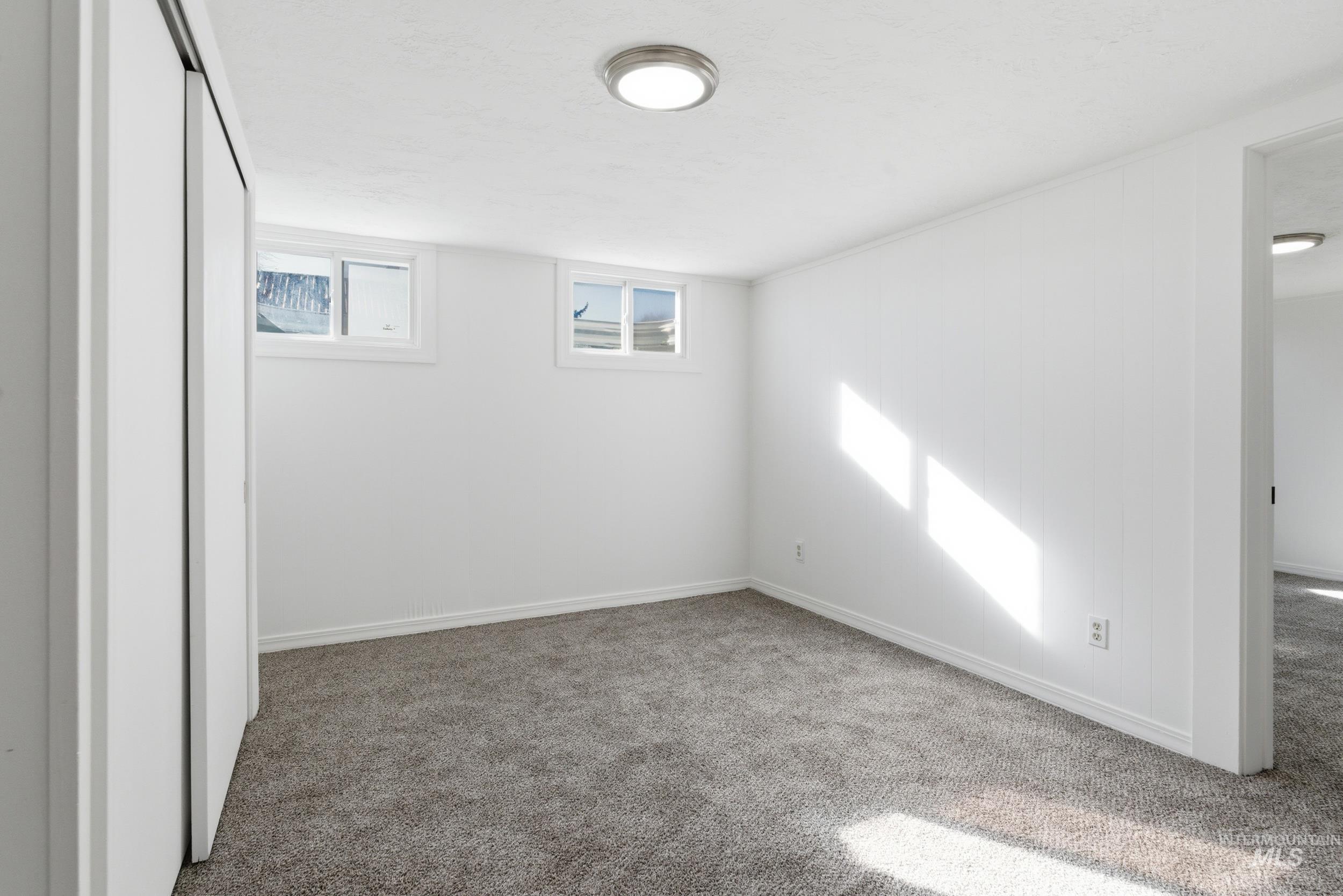 107 West Main Street Declo, ID 83323 - Photo 22 of 32 Unfurnished bedroom with carpet and baseboards