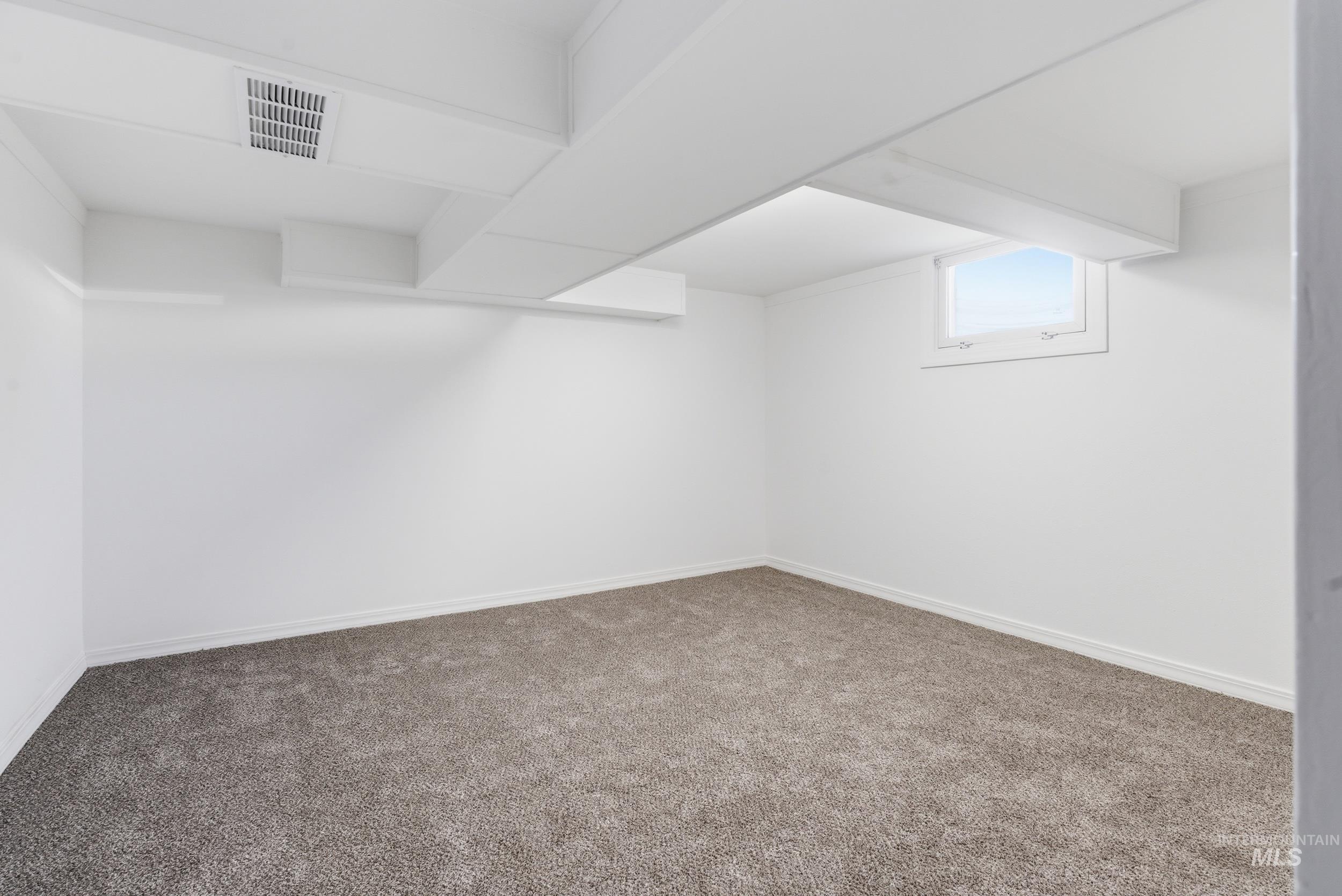 107 West Main Street Declo, ID 83323 - Photo 24 of 32 Basement with carpet flooring and baseboards