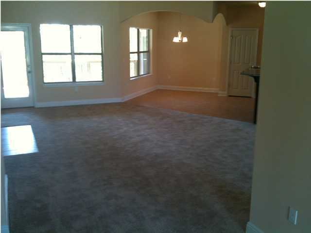663 Red Fern Road Crestview, FL 32536 - Photo 2 of 12 an empty room with windows