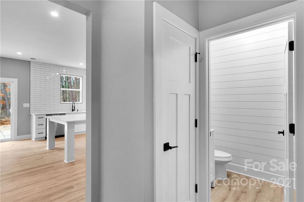 13500 Old Camden Road Midland, NC 28107 - Photo 13 of 41 a bathroom with a sink a toilet and shower
