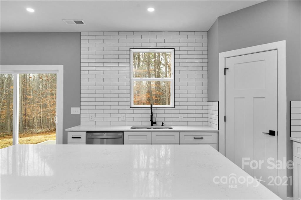 13500 Old Camden Road Midland, NC 28107 - Photo 18 of 41 a bathroom with a bathtub and a sink