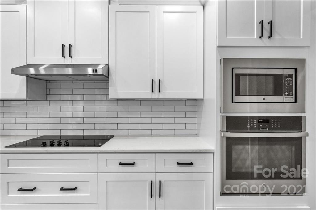 13500 Old Camden Road Midland, NC 28107 - Photo 19 of 41 a kitchen with a sink and cabinets