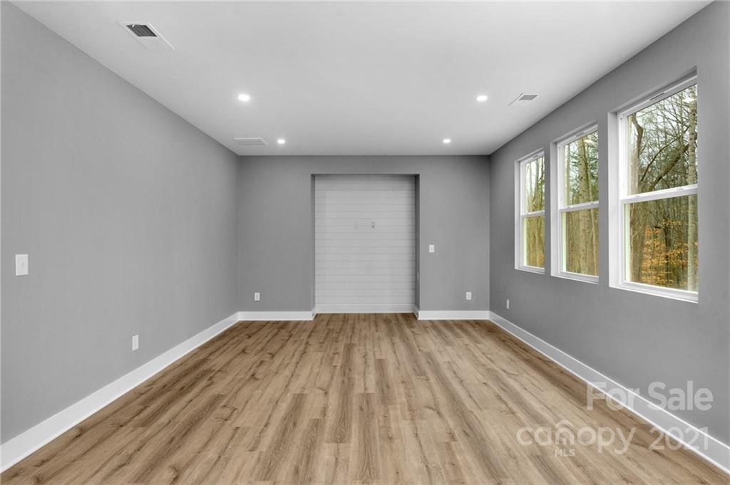 13500 Old Camden Road Midland, NC 28107 - Photo 25 of 41 wooden floor in an empty room with a window