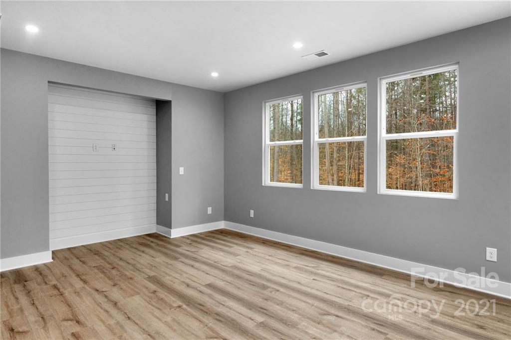 13500 Old Camden Road Midland, NC 28107 - Photo 26 of 41 a view of empty room with wooden floor