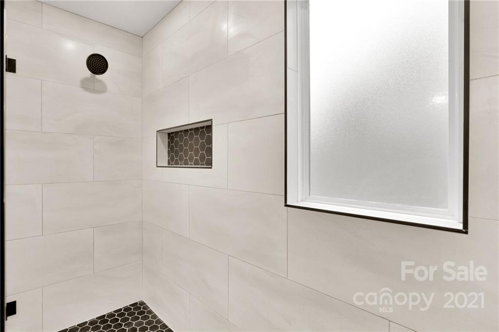 13500 Old Camden Road Midland, NC 28107 - Photo 32 of 41 a bathroom with a shower