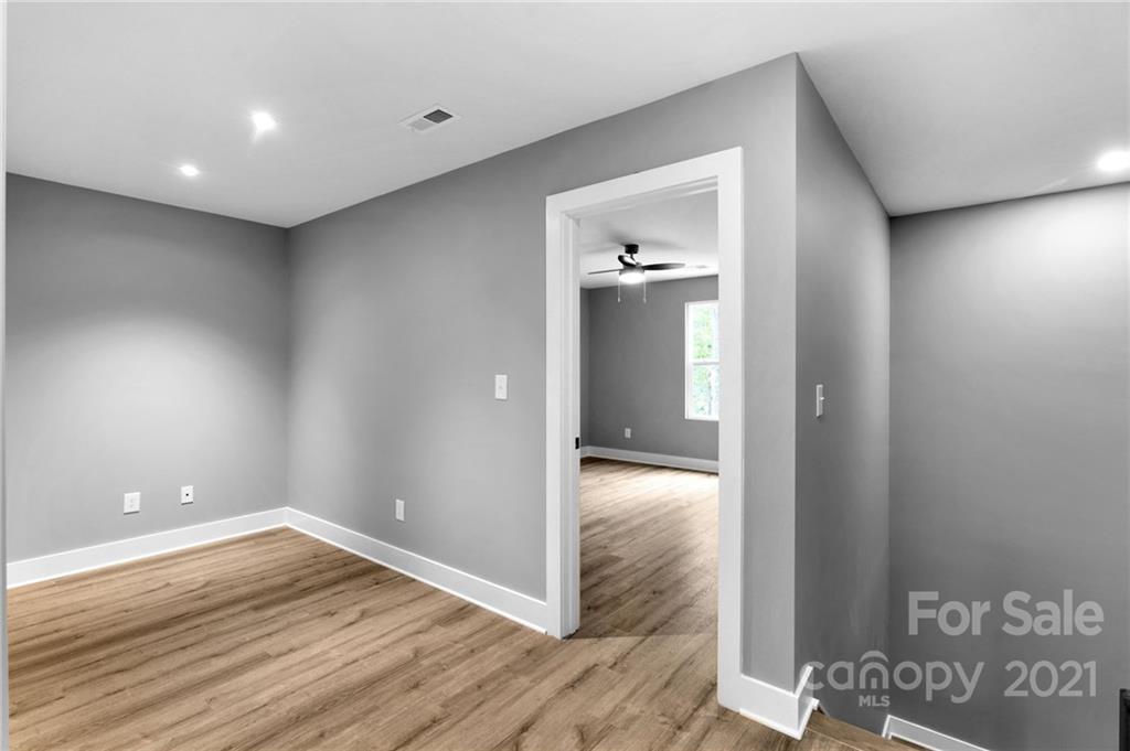13500 Old Camden Road Midland, NC 28107 - Photo 33 of 41 a view of empty room with wooden floor