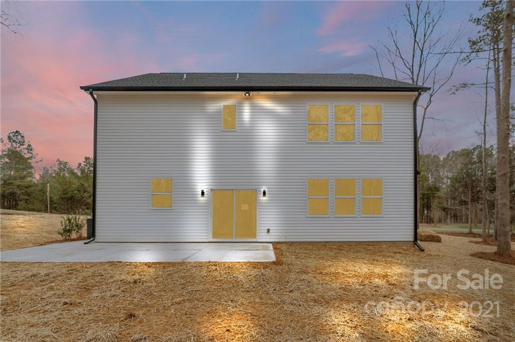 13500 Old Camden Road Midland, NC 28107 - Photo 4 of 41 a view of a back yard of the house