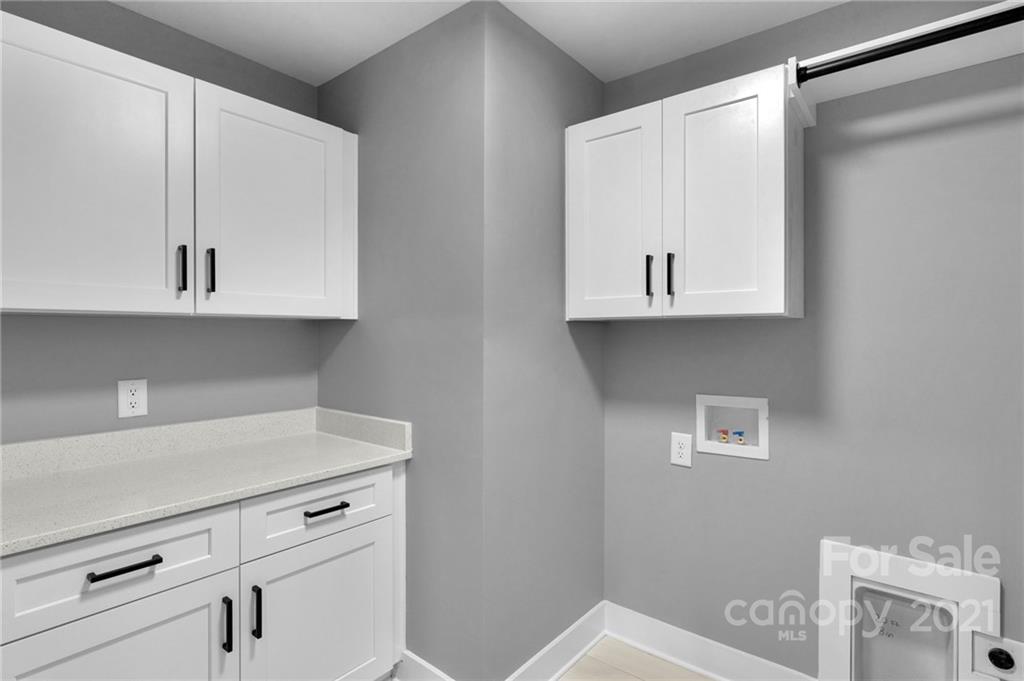 13500 Old Camden Road Midland, NC 28107 - Photo 41 of 41 a view of cabinets and wooden floor