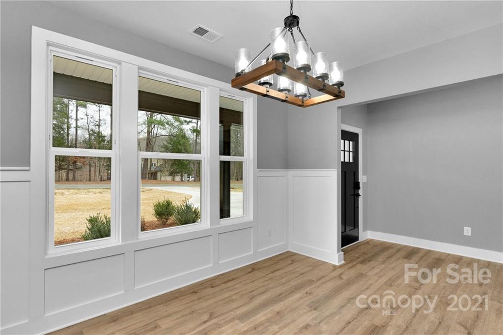 13500 Old Camden Road Midland, NC 28107 - Photo 9 of 41 a view of a room with a chandelier