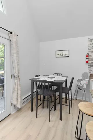 a view of a dining room with furniture