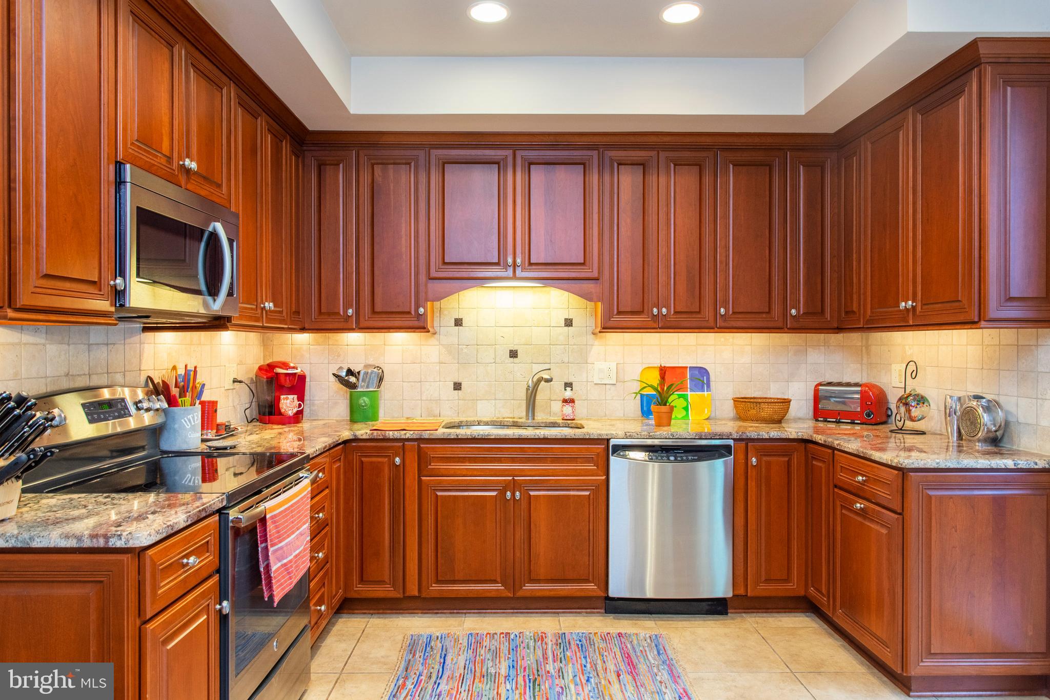 500 Berwyn Baptist Road, Unit 14 Devon, PA 19333 - Photo 22 of 49 Lovely cabinetry detail w/under cabinet lighting