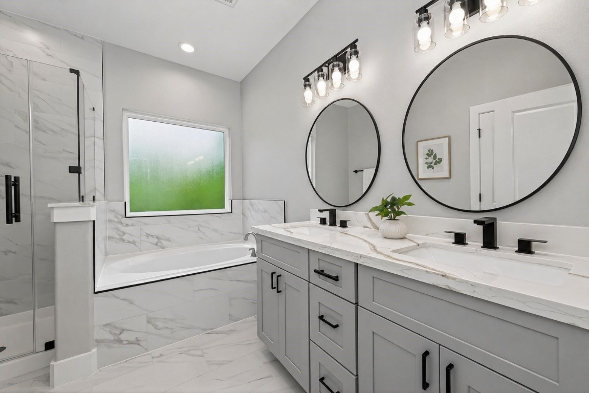 12431 Green Ridge Drive Willis, TX 77318 - Photo 17 of 37 Modern, spa-like primary bathroom with high-end finishes and a clean, elegant design.
