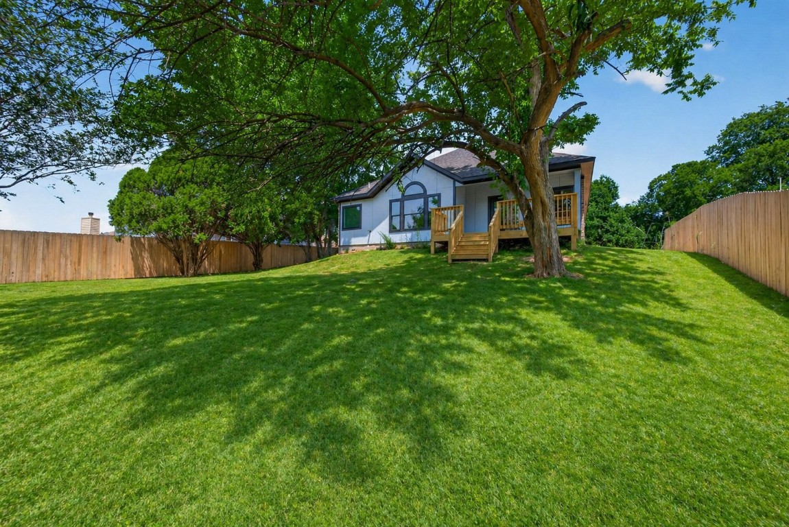 12431 Green Ridge Drive Willis, TX 77318 - Photo 30 of 37 Oversized backyard offering space, privacy, and endless possibilities for outdoor living.
