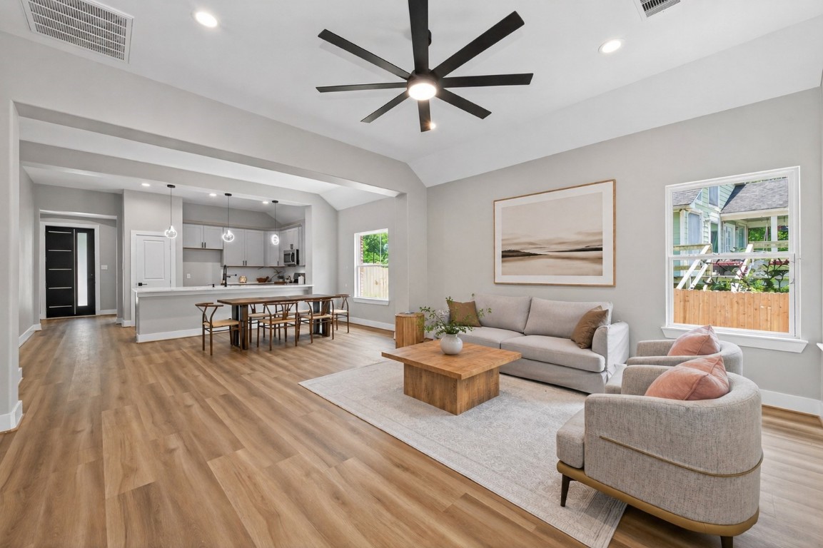 12431 Green Ridge Drive Willis, TX 77318 - Photo 7 of 37 Open dining area seamlessly connected to the living space, ideal for gatherings and everyday meals.