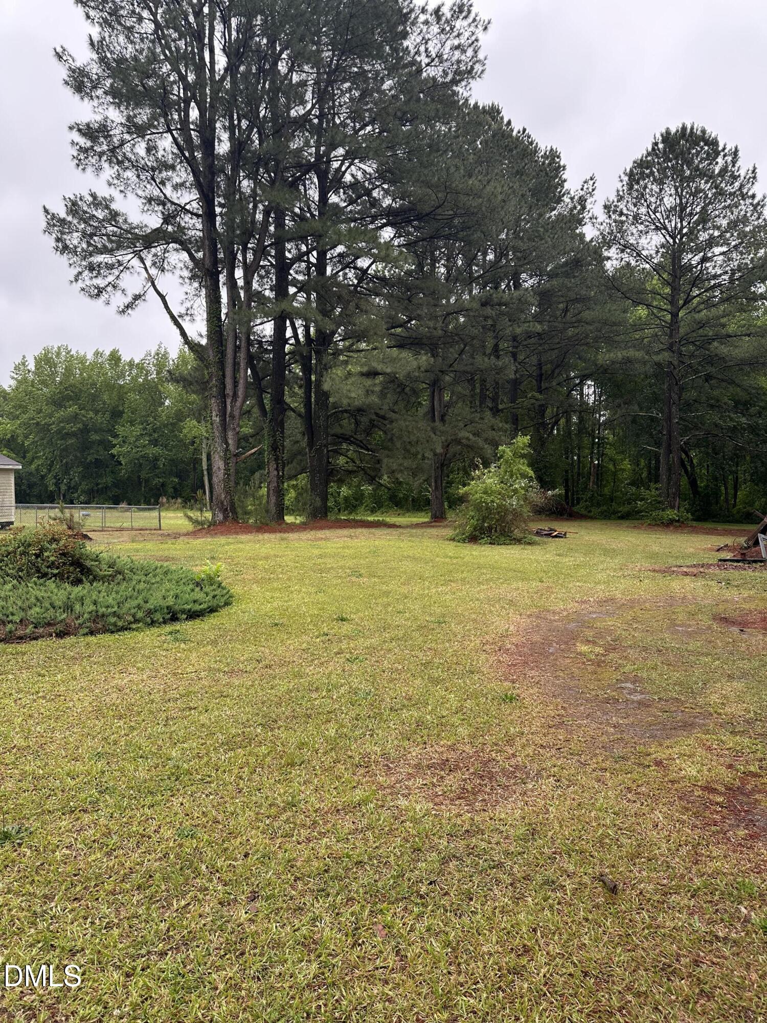 550 Phillips Road Selma, NC 27576 - Photo 4 of 16 a view of outdoor space with swimming pool and green space