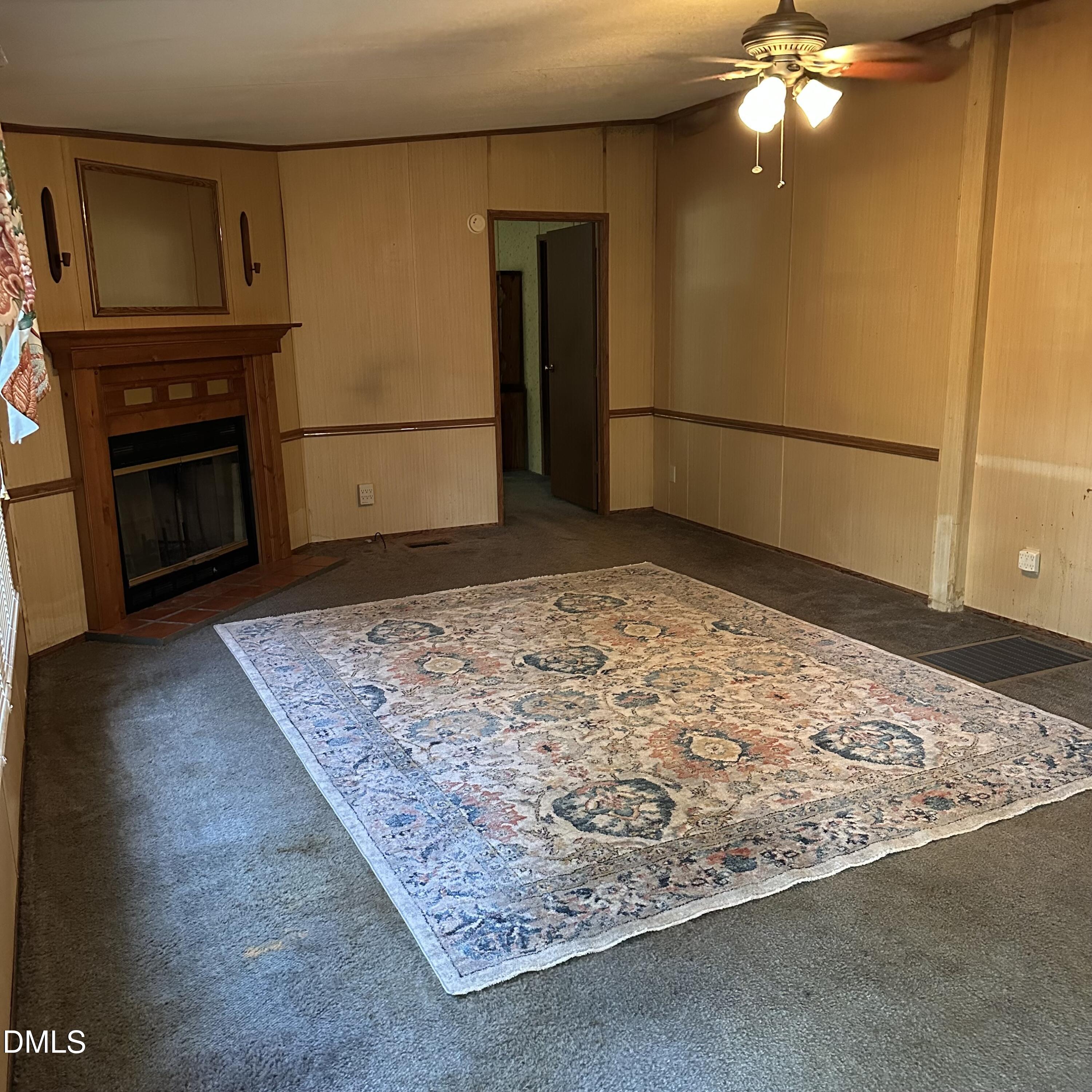 550 Phillips Road Selma, NC 27576 - Photo 6 of 16 a view of a livingroom with a fireplace