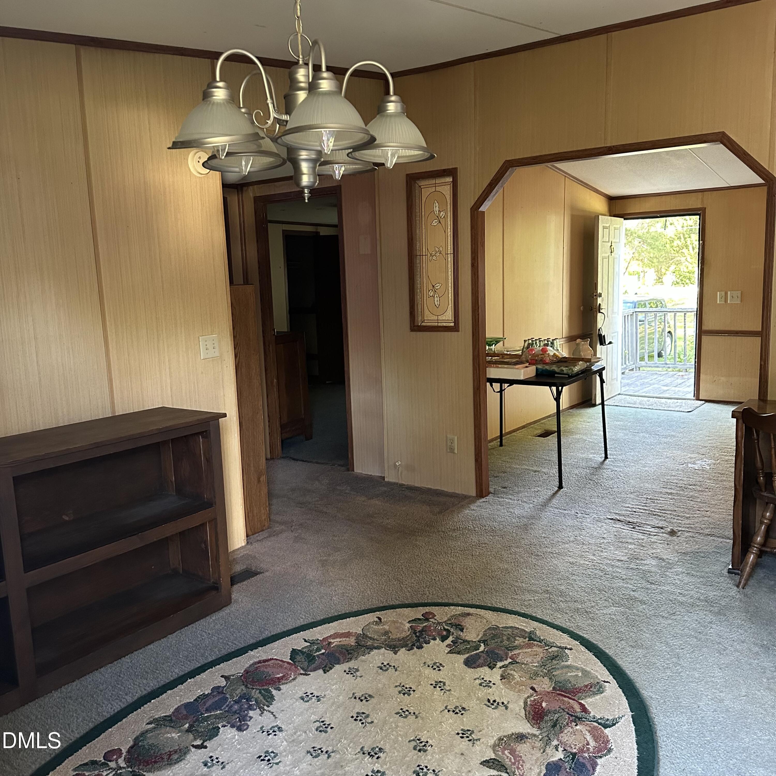 550 Phillips Road Selma, NC 27576 - Photo 8 of 16 a living room with furniture and a fireplace