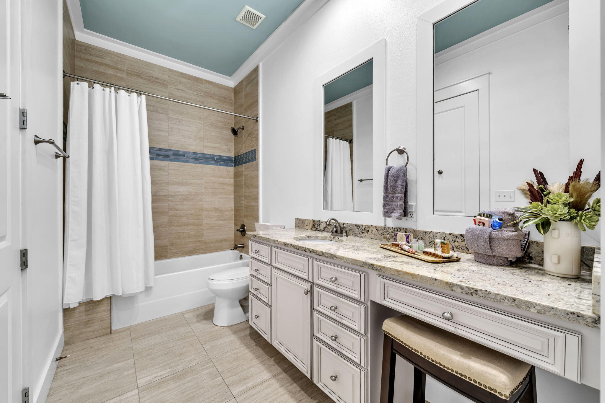 36 Moonlight Beach Lane Inlet Beach, FL 32461 - Photo 18 of 60 a spacious bathroom with a granite countertop sink a toilet a mirror and shower