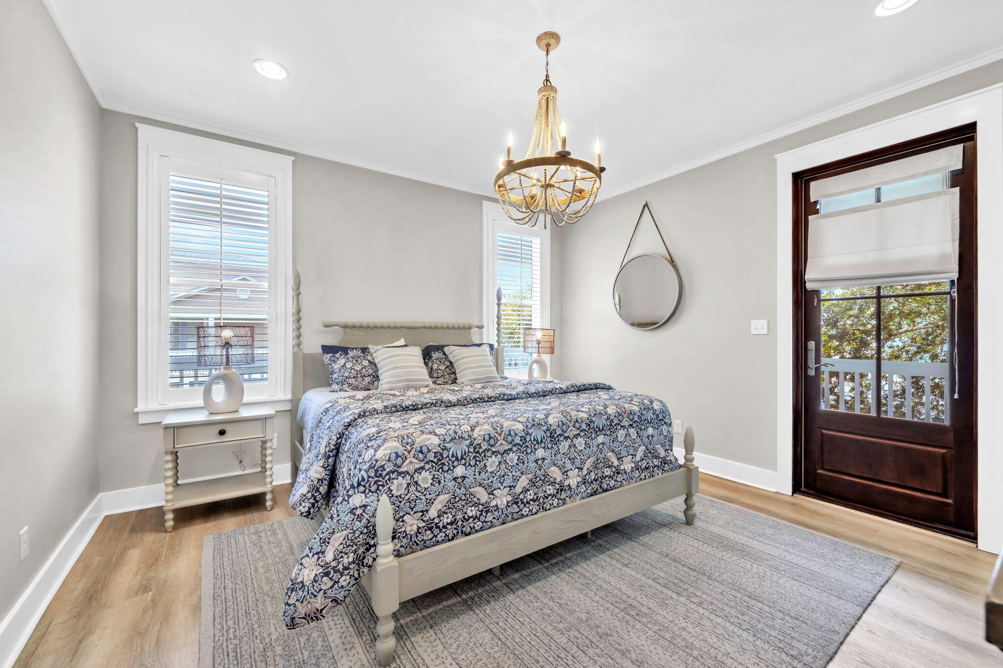 36 Moonlight Beach Lane Inlet Beach, FL 32461 - Photo 20 of 60 a bedroom with a large bed and a chandelier