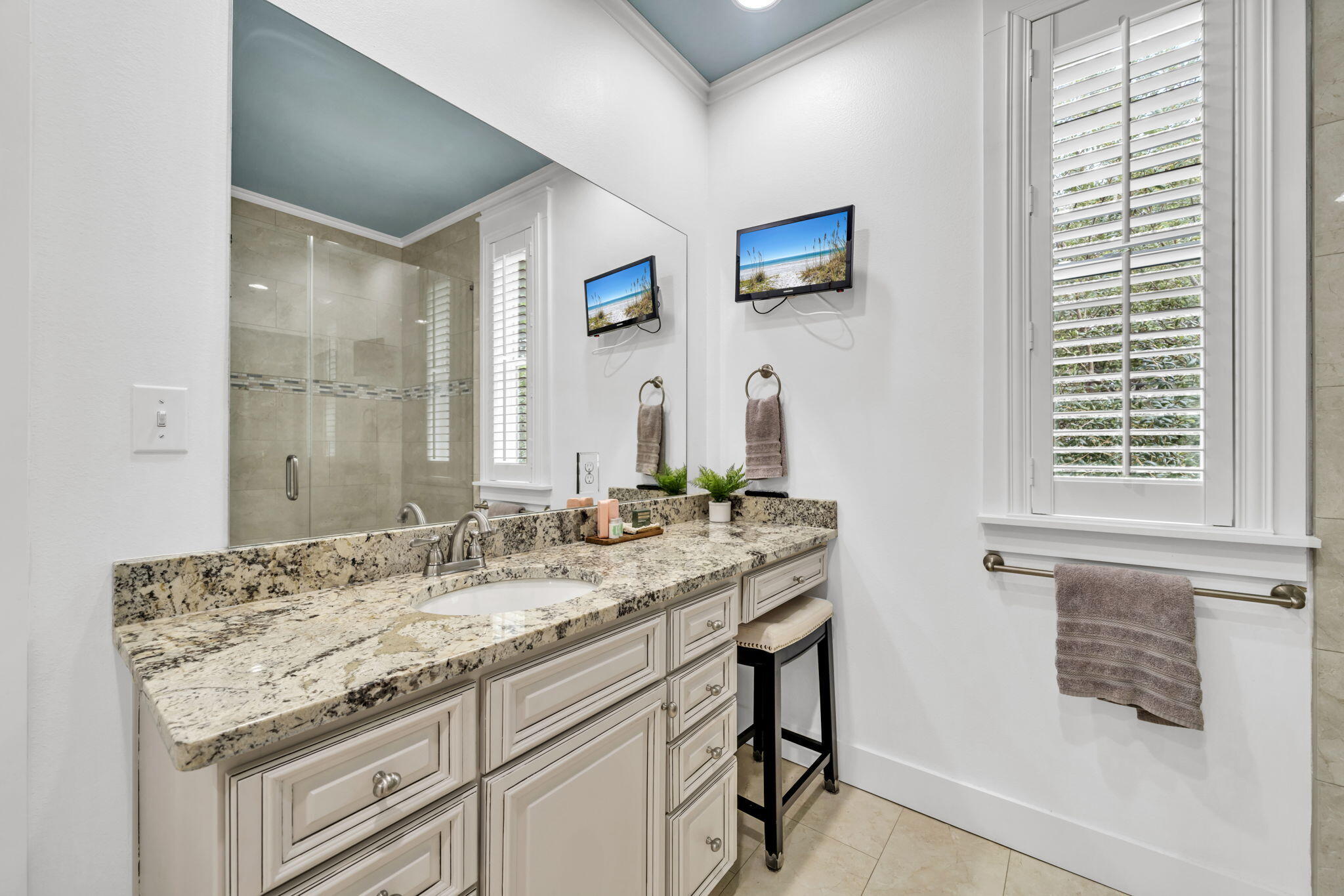 36 Moonlight Beach Lane Inlet Beach, FL 32461 - Photo 24 of 60 a bathroom with a granite countertop sink and a mirror
