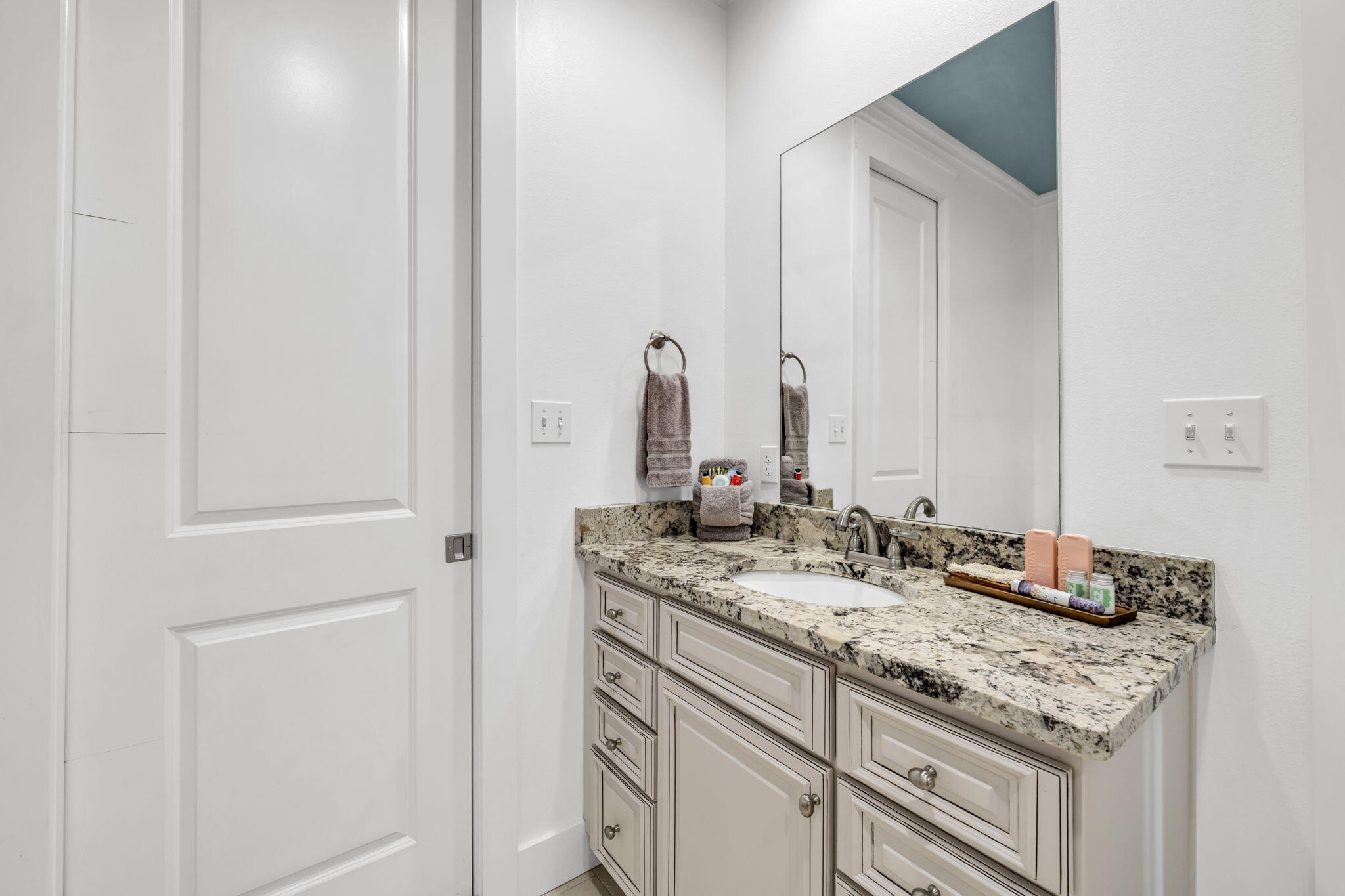 36 Moonlight Beach Lane Inlet Beach, FL 32461 - Photo 25 of 60 a bathroom with a sink and a mirror