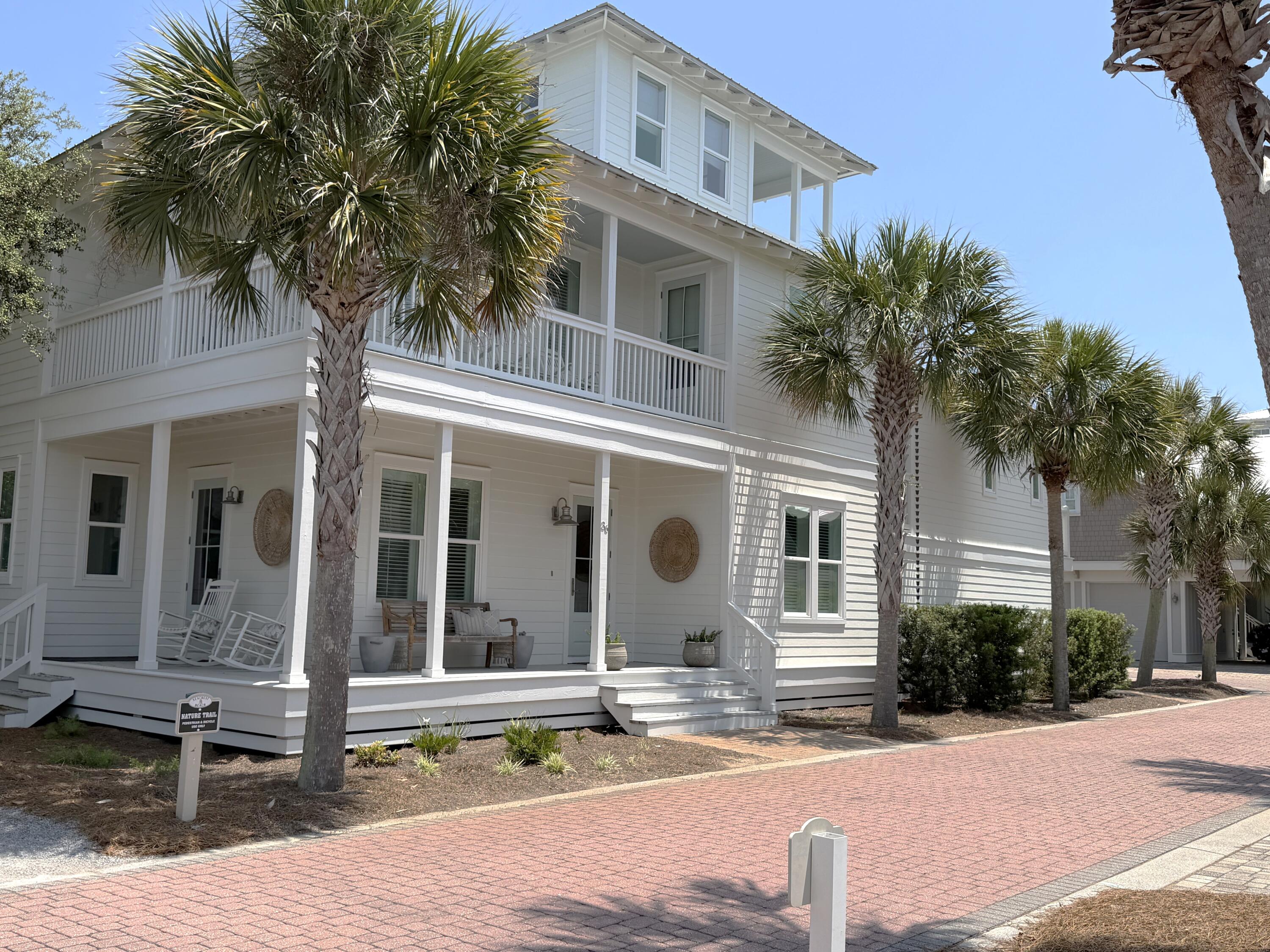 36 Moonlight Beach Lane Inlet Beach, FL 32461 - Photo 51 of 60 a front view of a house with garden and plants