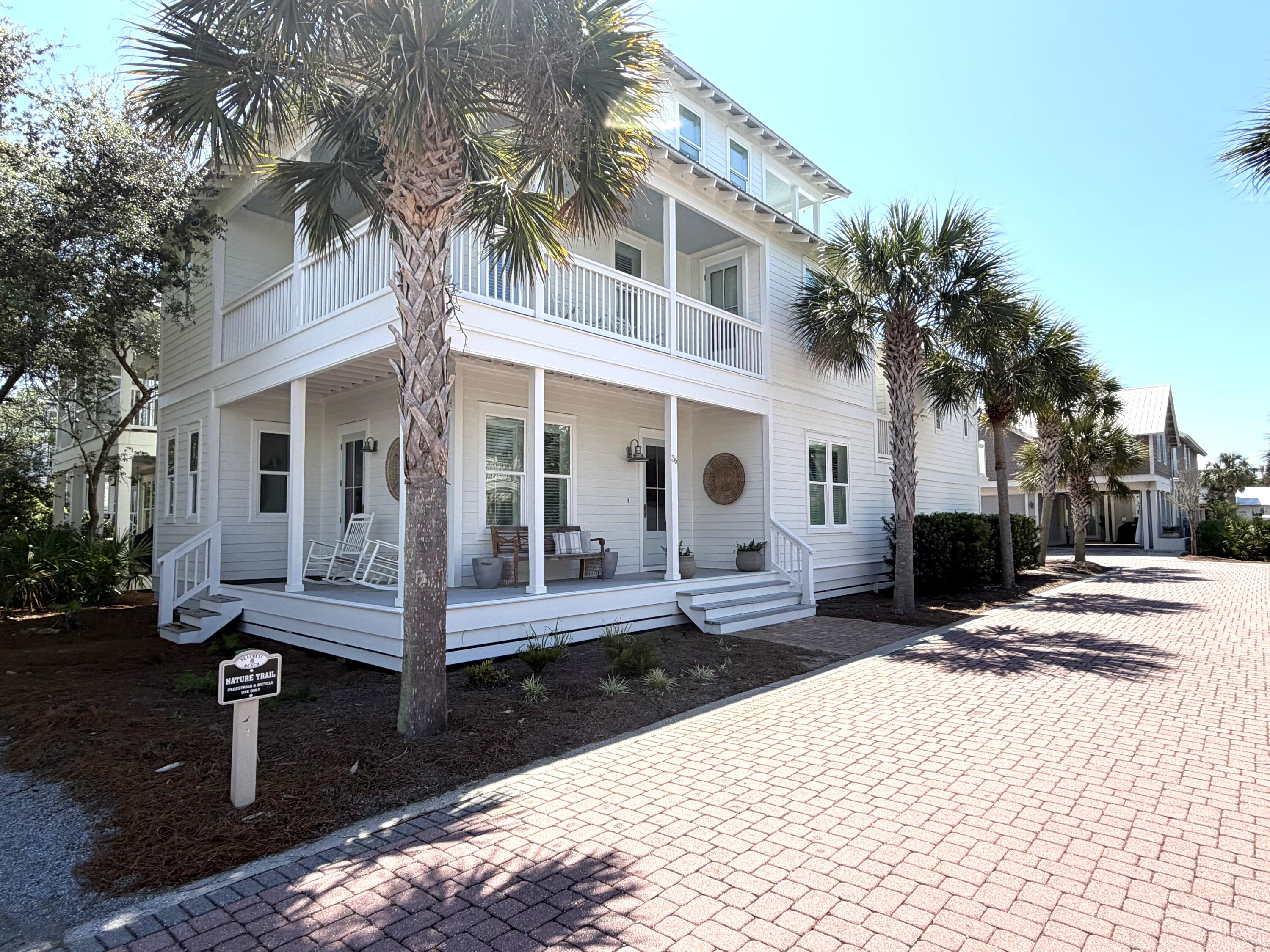 36 Moonlight Beach Lane Inlet Beach, FL 32461 - Photo 57 of 60 a view of a house with backyard and sitting area