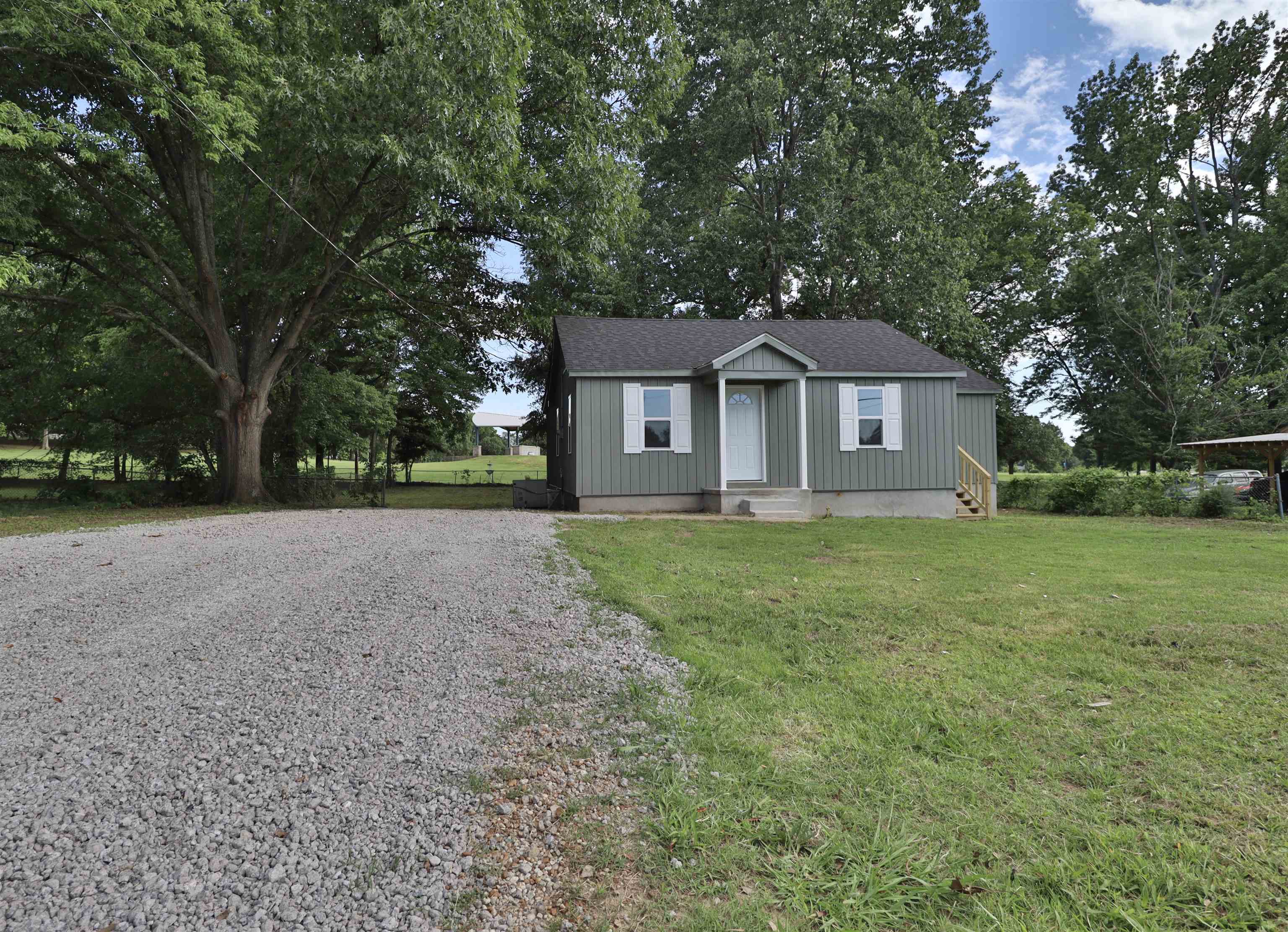 224 Kellar Avenue Ripley, TN 38063 - Photo 34 of 35 a front view of house with yard and green space