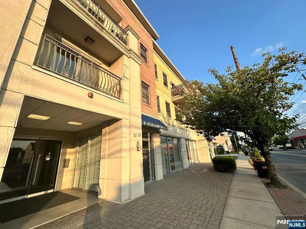 a view of a building with a street