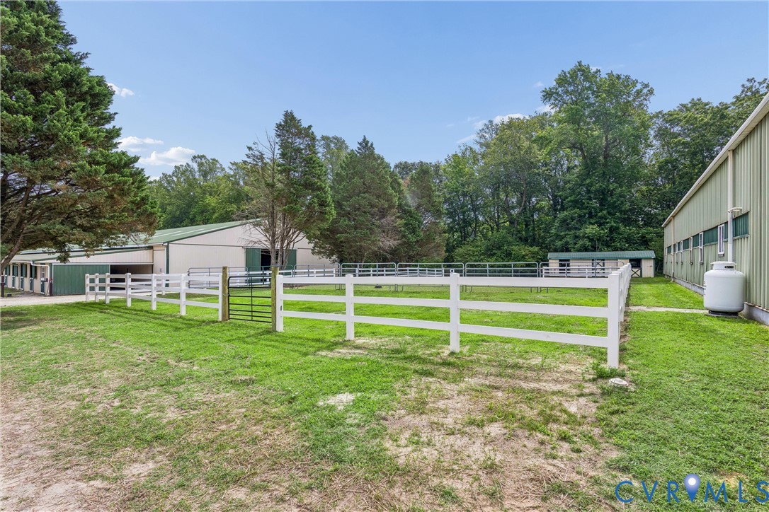 2016 Forge Road Toano, VA 23168 - Photo 76 of 99 Fenced pasture area featuring a white four-rail fe