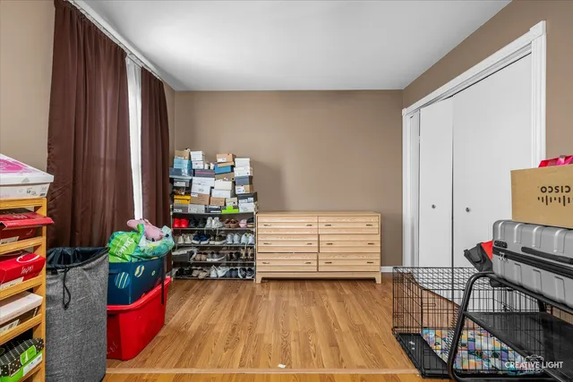 a room with furniture and a wooden floor