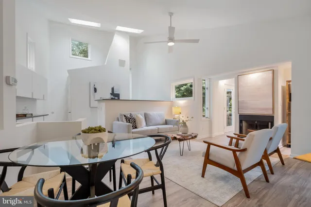 a view of a two chairs in the balcony