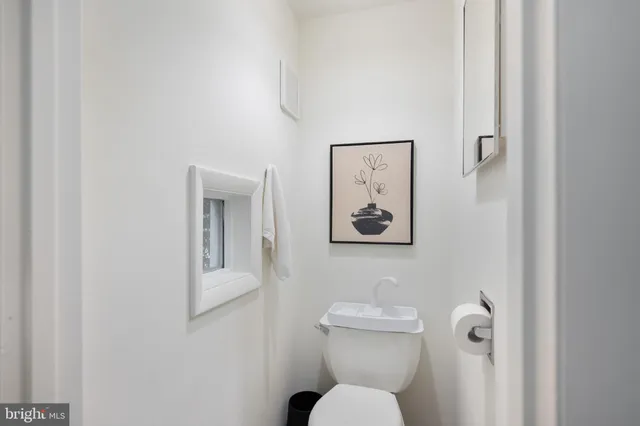 a kitchen with a stove a sink and a refrigerator