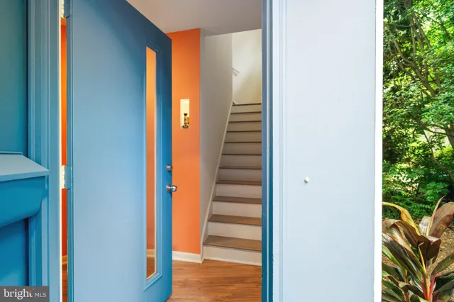 a view of a house with a tree