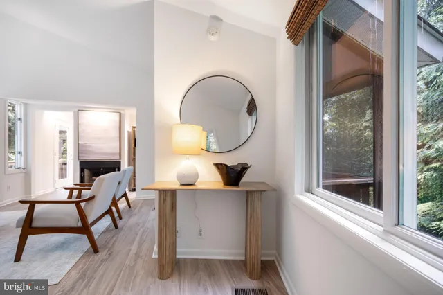 a view of entryway with wooden floor